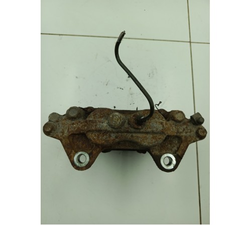 Суппорт тормозной передний левый