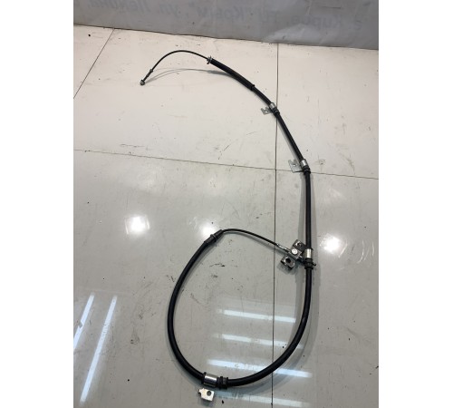 Трос стояночного тормоза (передний, левый)