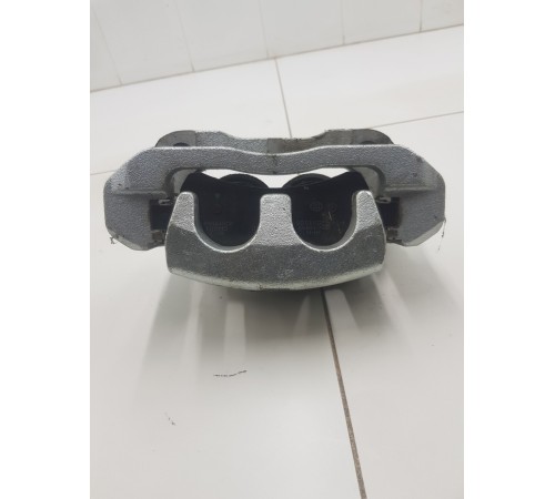 Суппорт тормозной передний левый