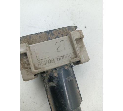 Форсунка омывателя фар левая