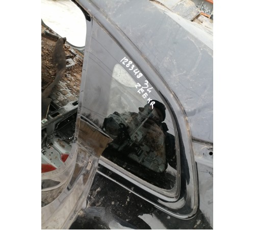 Глухое стекло заднее левое