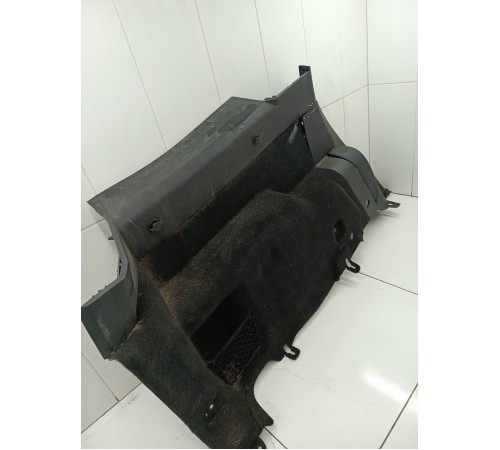 Обшивка багажника левая