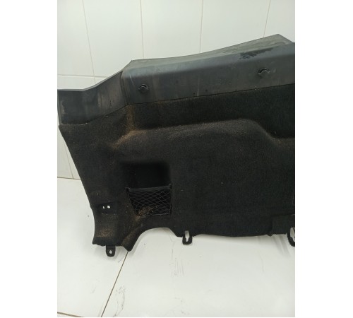 Обшивка багажника левая