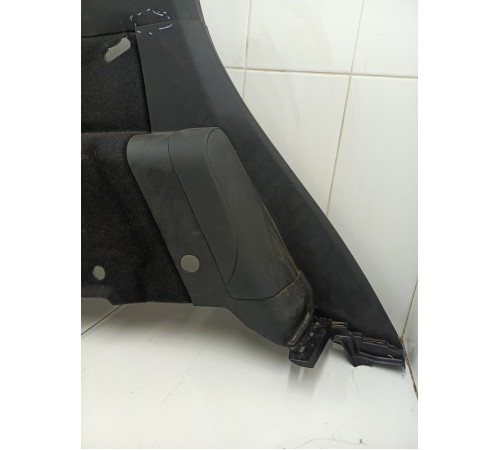 Обшивка багажника левая