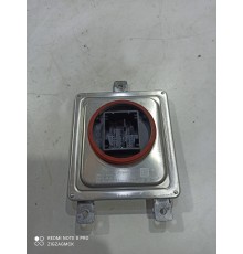 Блок розжига фары левый