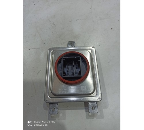 Блок розжига фары левый