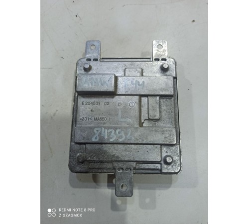 Блок розжига фары левый