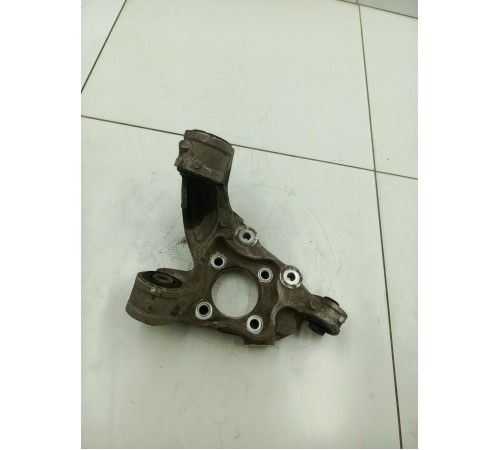 Кулак поворотный задний левый