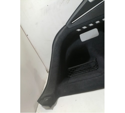 Обшивка багажника левая