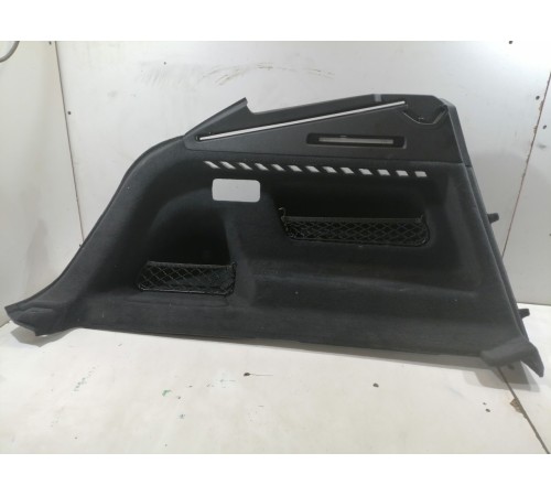 Обшивка багажника левая