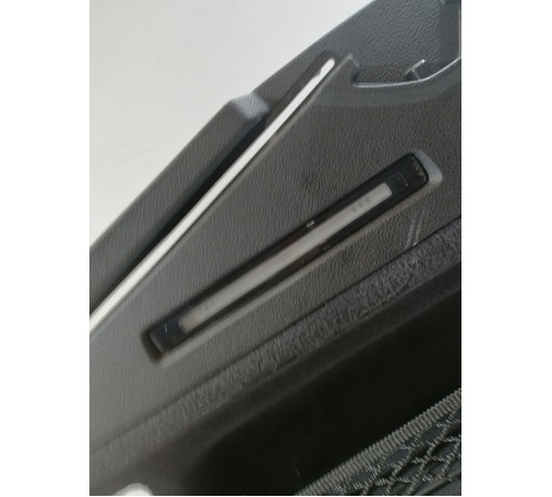 Обшивка багажника левая