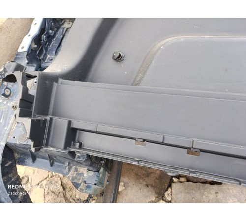 Обшивка багажника левая