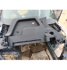 Обшивка багажника левая