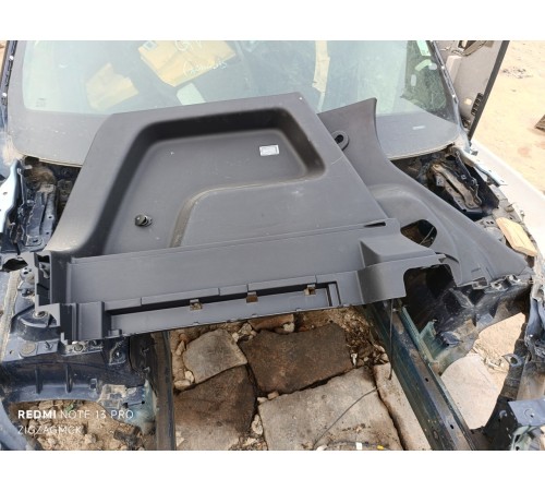 Обшивка багажника левая