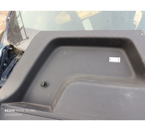 Обшивка багажника левая