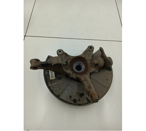 Кулак поворотный передний левый в сборе