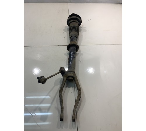 Амортизатор (передний, левый)