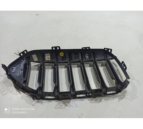 Решетка радиатора левая