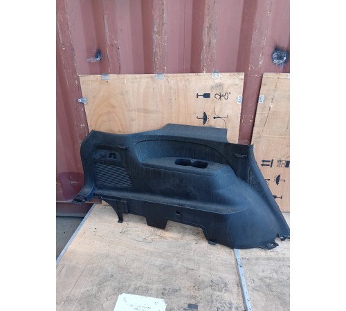 Обшивка багажника левая