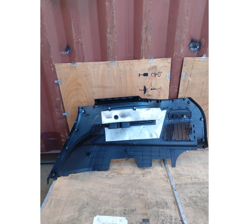 Обшивка багажника левая