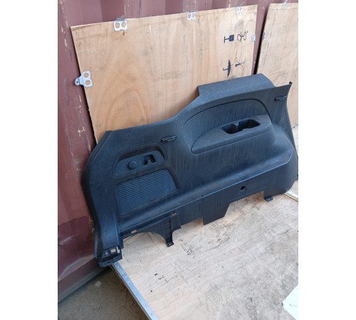 Обшивка багажника левая