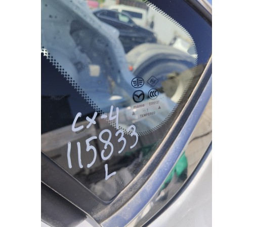 Глухое стекло заднее левое