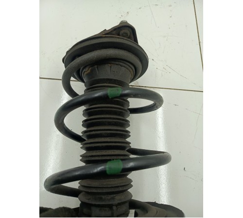 Амортизатор в сборе передний левый