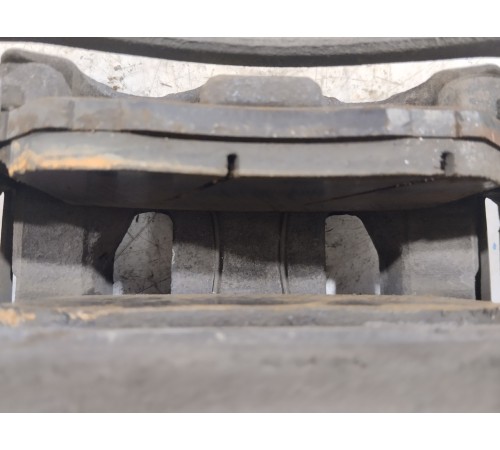 Суппорт тормозной передний левый