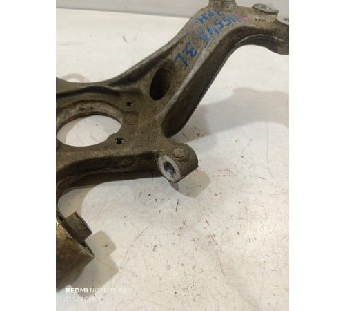 Кулак поворотный задний левый