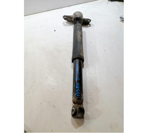 Амортизатор задний левый