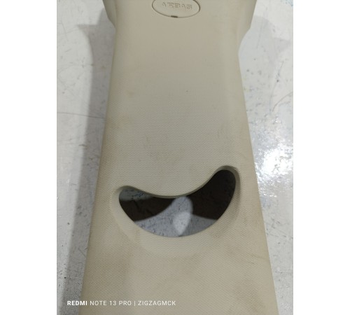 Обшивка центральной стойки левая верхняя 