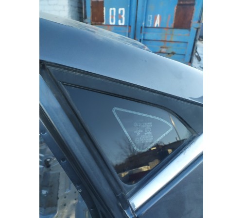 Стекло заднее левое глухое