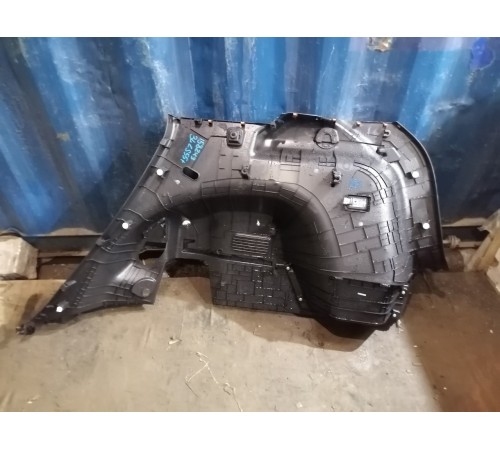 Обшивка багажника левая