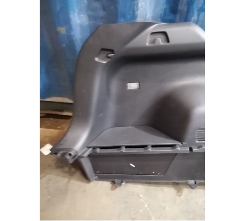 Обшивка багажника левая