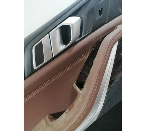 Обшивка двери передняя левая