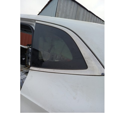 Глухое стекло заднее левое