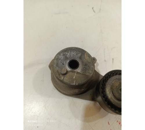 Ролик натяжителя ремня