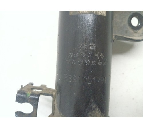 Амортизатор подвески передний левый в сборе