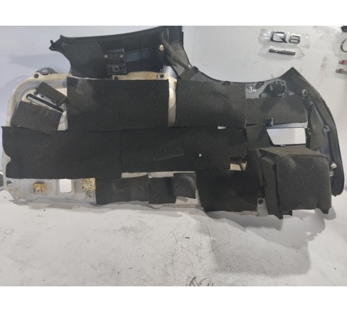 Обшивка багажника левая