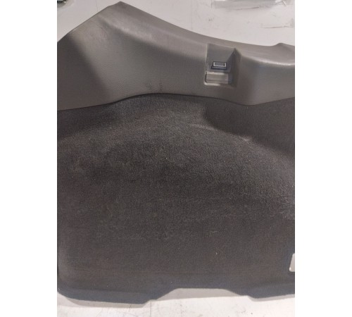 Обшивка багажника левая