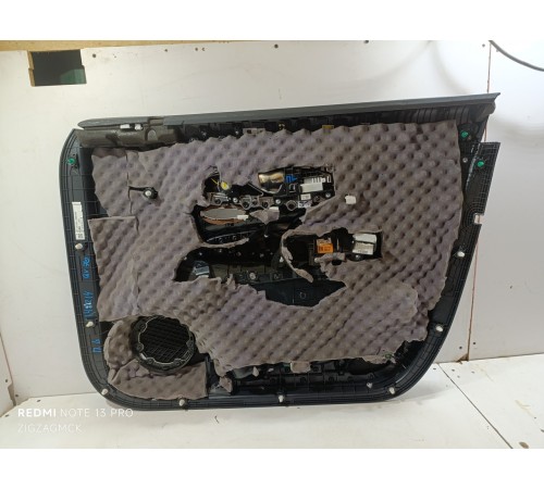 Обшивка двери передняя левая