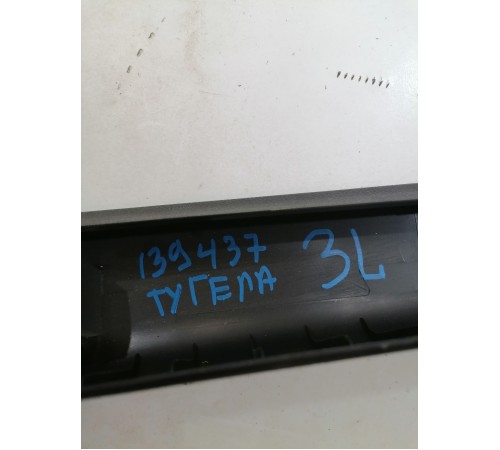 Обшивка двери багажника левая