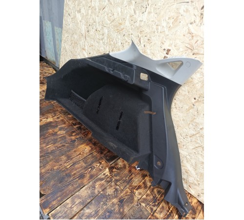 Обшивка багажника задняя левая