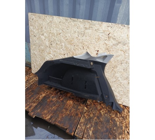 Обшивка багажника задняя левая