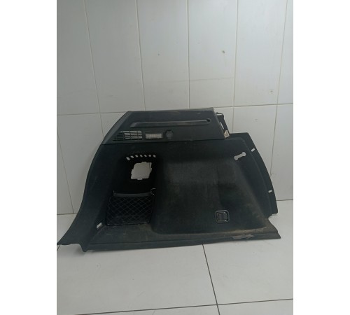 Обшивка багажника левая