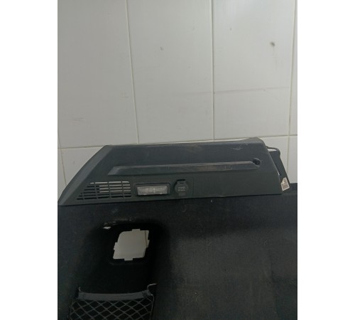 Обшивка багажника левая