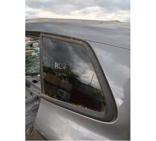 Глухое стекло заднее левое