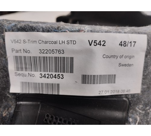 Обшивка багажника (левая)