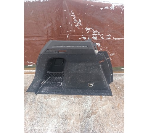 Обшивка багажника левая