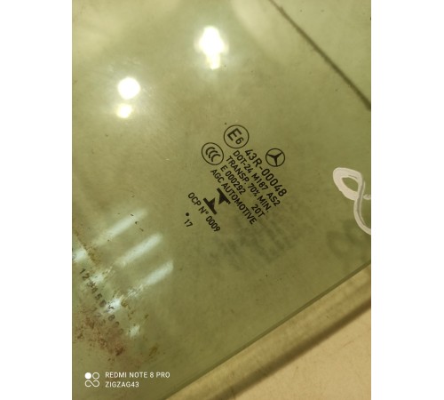 Стекло двери (заднее левое)